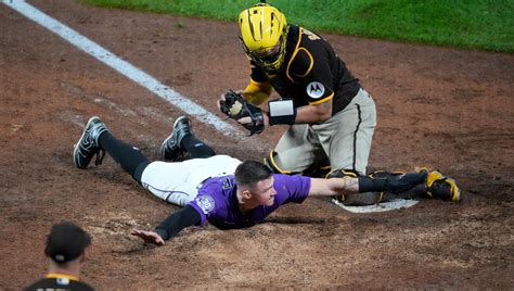 Rockies use Ryan McMahon’s sacrifice fly to score sliding Brenton Doyle, walk off Padres 4-3 in 10th inning in series opener